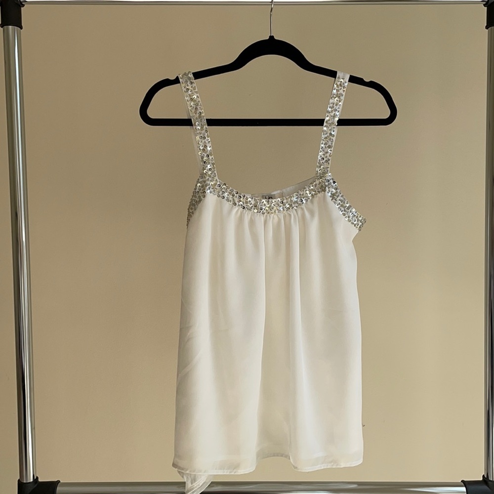 White top with sequence detail
